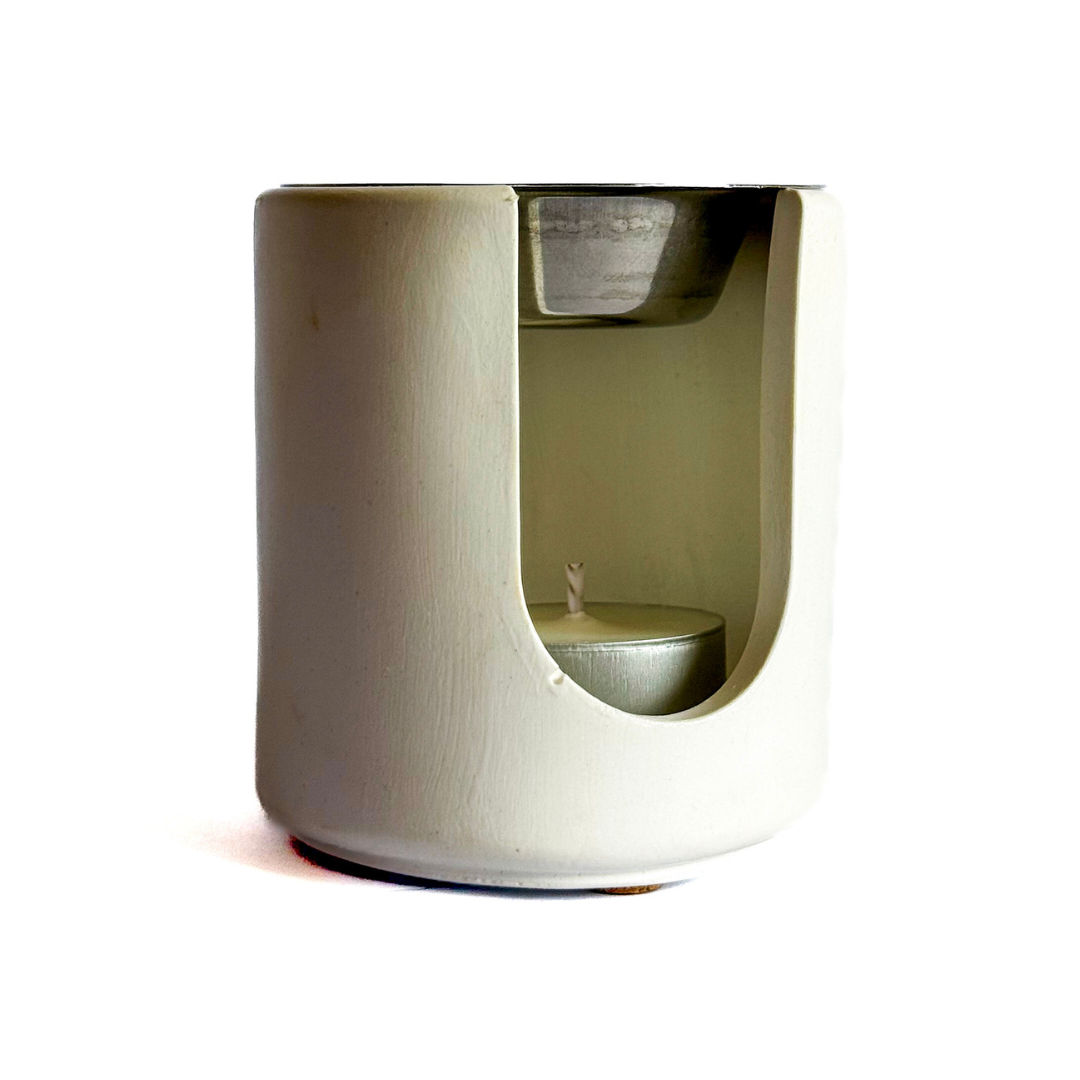 12. Quemador artesanal de esencias y wax melts + vela de té